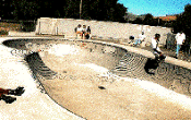 A photograph of children skateboarding.