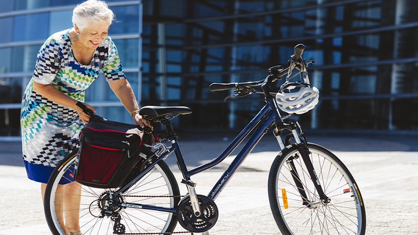 A lady checking her bike equipment